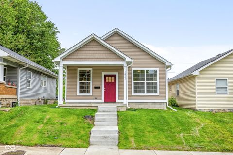 Photo of 1827 Tallman Avenue, Indianapolis, IN 46218 (MLS # 22103472)