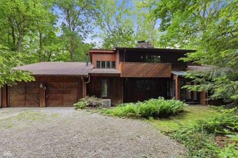 Photo of 7953 Spring Mill Road, Indianapolis, IN 46260 (MLS # 22096515)