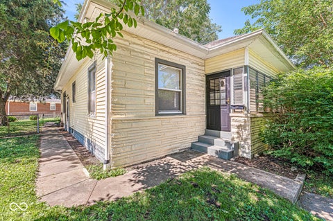 Photo of 1921 E Pleasant Run Parkway South Drive, Indianapolis, IN 46203 (MLS # 22104441)