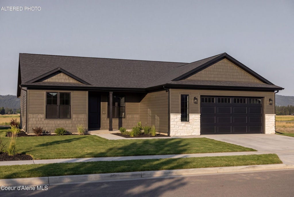 Photo of 12285 Rochester Ave, Post Falls, ID 83854 (MLS # 26-10157)