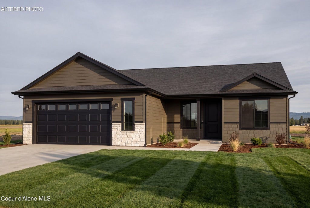 Photo of 12285 Rochester Ave, Post Falls, ID 83854 (MLS # 26-10157)