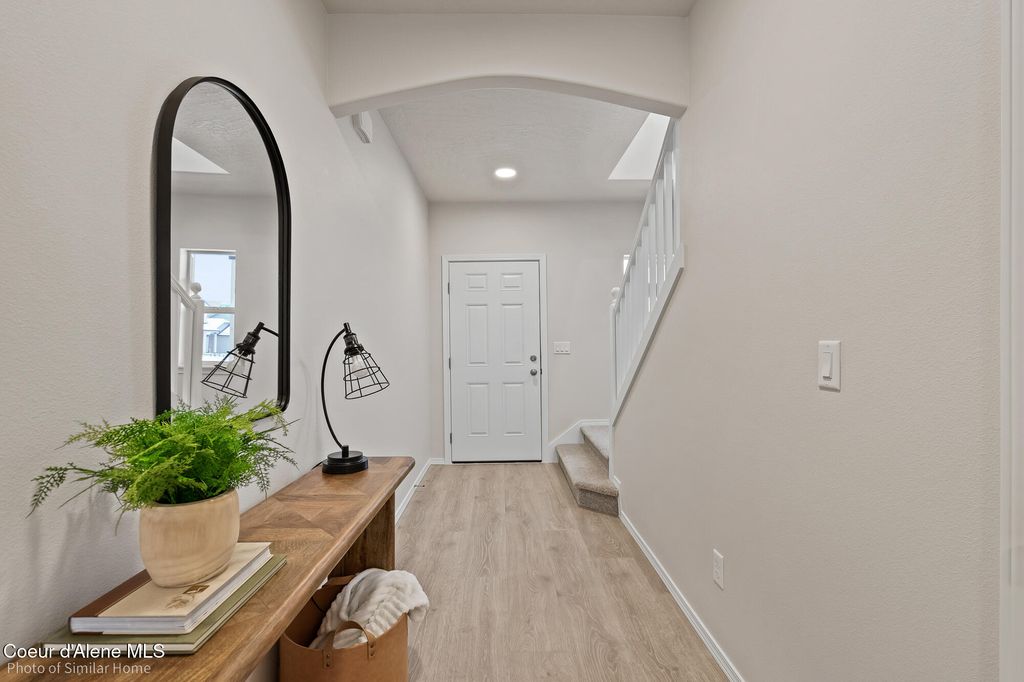 Photo of 13508 GRAND TARGHEE St, Hayden, ID 83835 (MLS # 25-9953)
