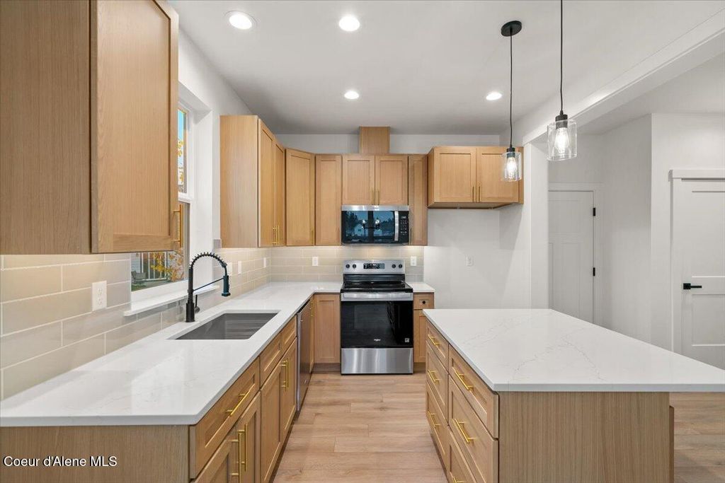 Photo of 304 Grosbeak, Hayden, ID 83835 (MLS # 26-1068)