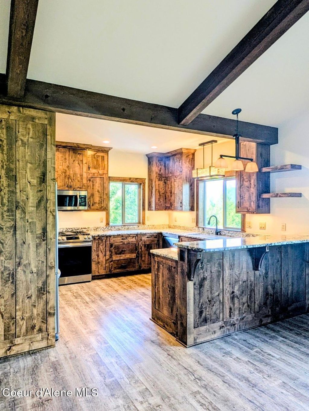 Photo of 273 Paradise Valley Valley, Bonners Ferry, ID 83805 (MLS # 26-4942)