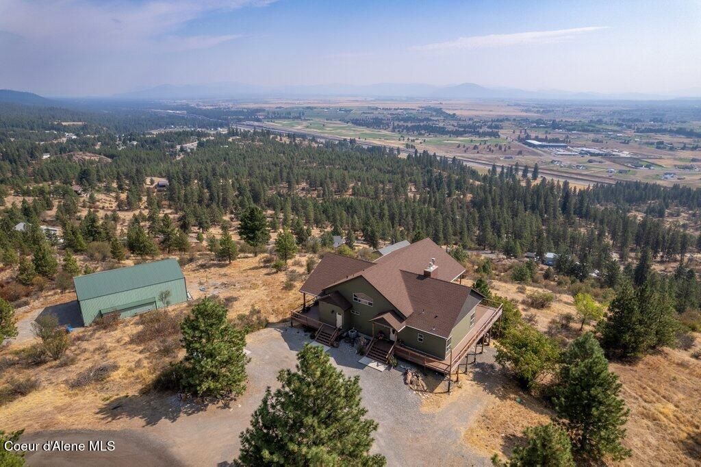 Photo of 10653 Payment Peak Rd, Hauser, ID 83854 (MLS # 25-9418)