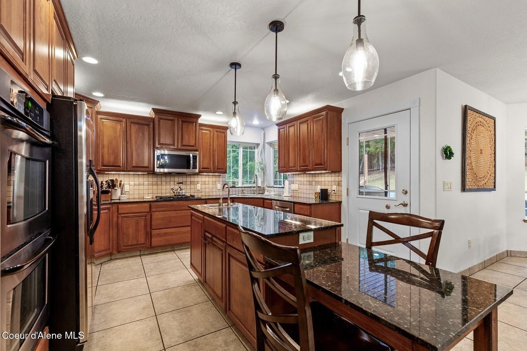 Photo of 11074 Riverview, Post Falls, ID 83854 (MLS # 26-6842)