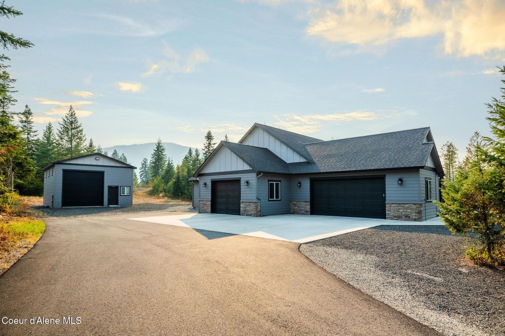 Photo of 5864 TWIN LAKES Rd, Rathdrum, ID 83858 (MLS # 25-9209)