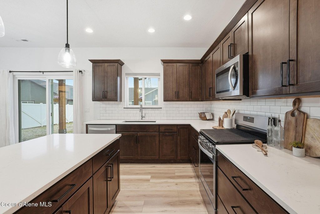 Photo of 8323 Splitrail Ave, Rathdrum, ID 83858 (MLS # 26-698)