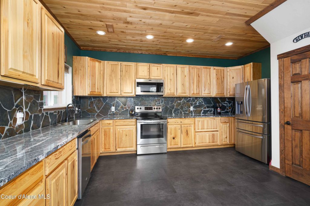 Photo of 12251 Blessing Hill Hill, Post Falls, ID 83854 (MLS # 26-2902)