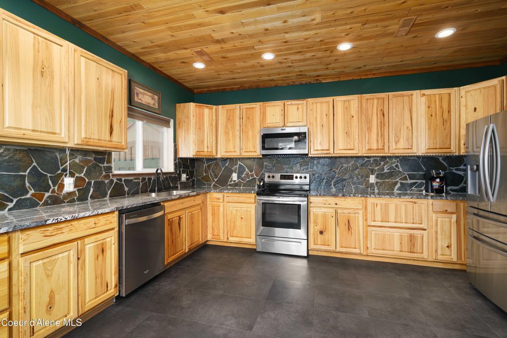 Photo of 12251 Blessing Hill Hill, Post Falls, ID 83854 (MLS # 26-2902)