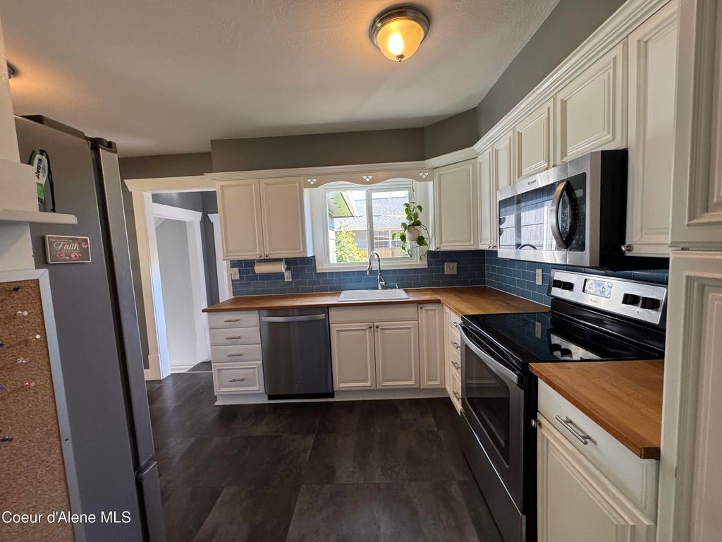 Photo of 843 17th St, Coeur dAlene, ID 83814 (MLS # 26-4813)