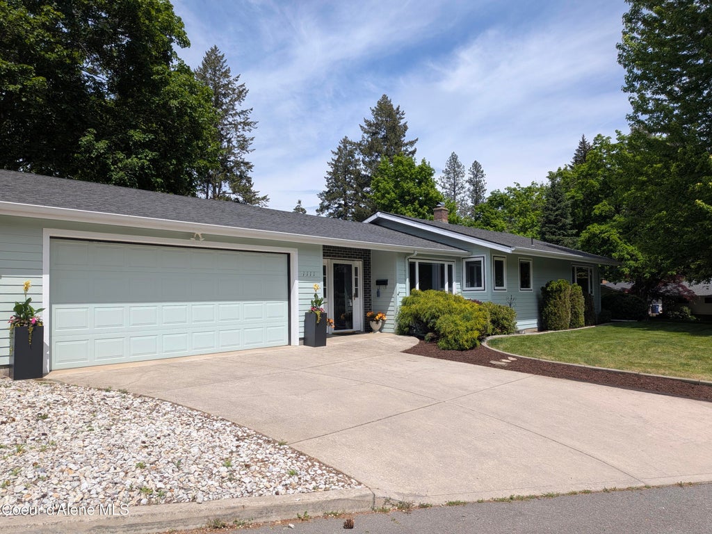 Photo of 1111 MOUNTAIN Ave, Coeur dAlene, ID 83814 (MLS # 26-416)