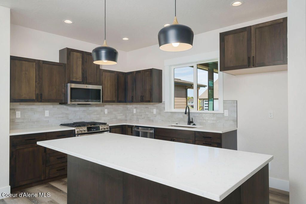 Photo of 7365 Breaux Dr, Coeur dAlene, ID 83815 (MLS # 25-11348)