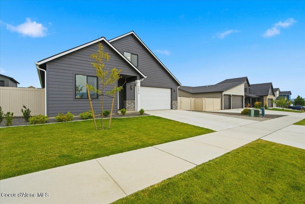 Photo of 6696 Portrush Dr, Rathdrum, ID 83858 (MLS # 26-8995)