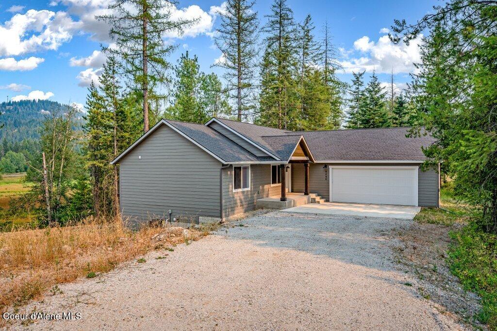 Photo of 9490 Sunnyside Rd, Sandpoint, ID 83864 (MLS # 26-8098)
