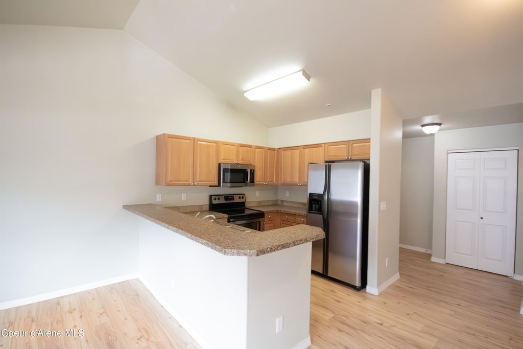 Photo of 322 Promenade Loop #APT 212, Post Falls, ID 83854 (MLS # 26-3226)