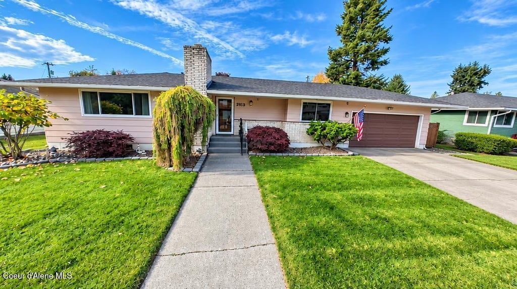 Photo of 2313 HONEYSUCKLE DR, Coeur dAlene, ID 83814 (MLS # 26-10176)