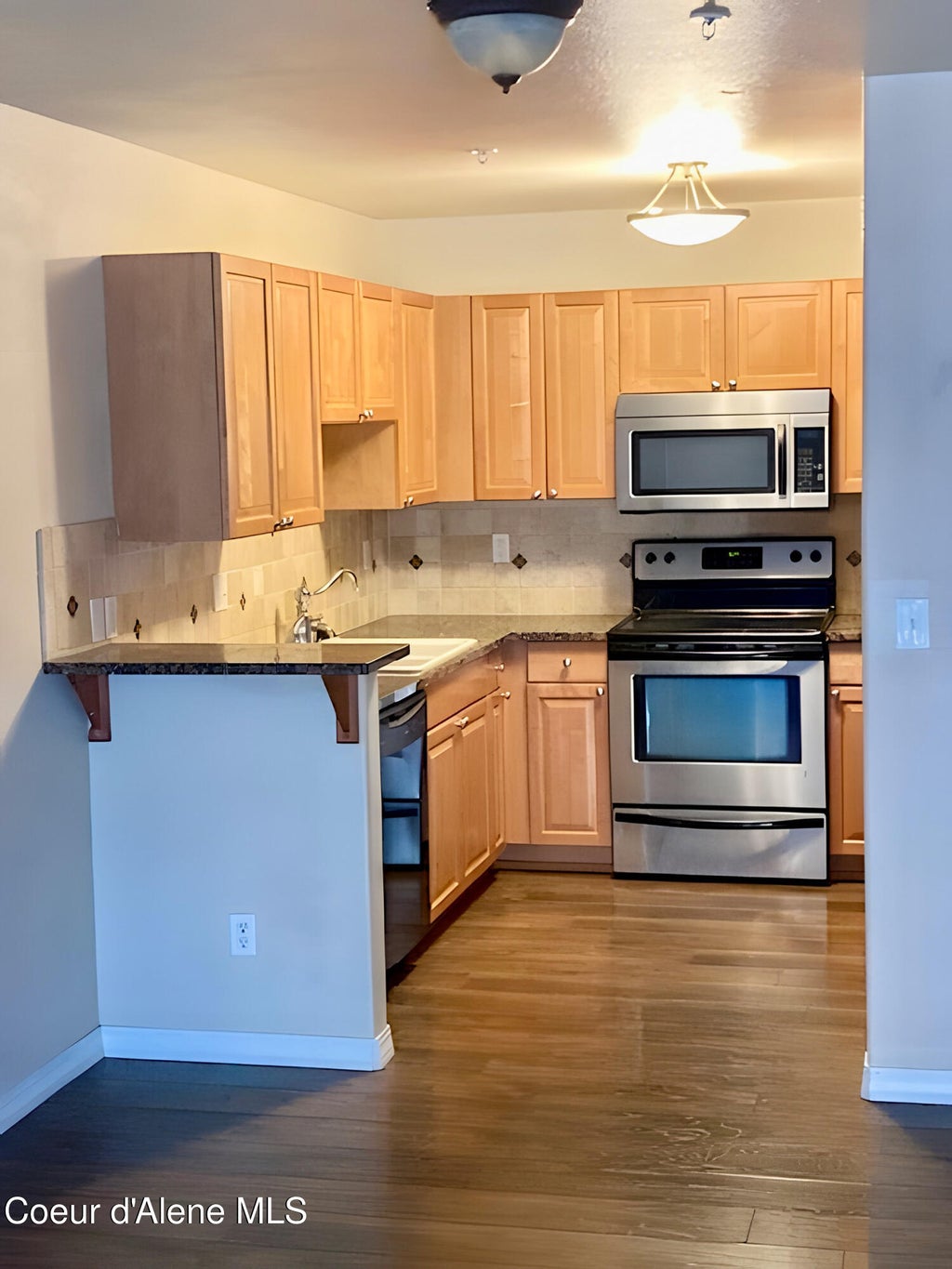 Photo of 352 Promenade LOOP #APT 207, Post Falls, ID 83854 (MLS # 26-9406)