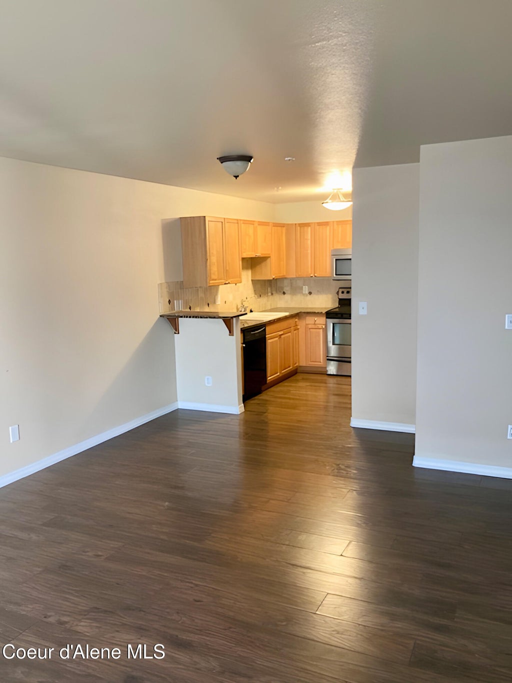 Photo of 352 Promenade LOOP #APT 207, Post Falls, ID 83854 (MLS # 26-9406)