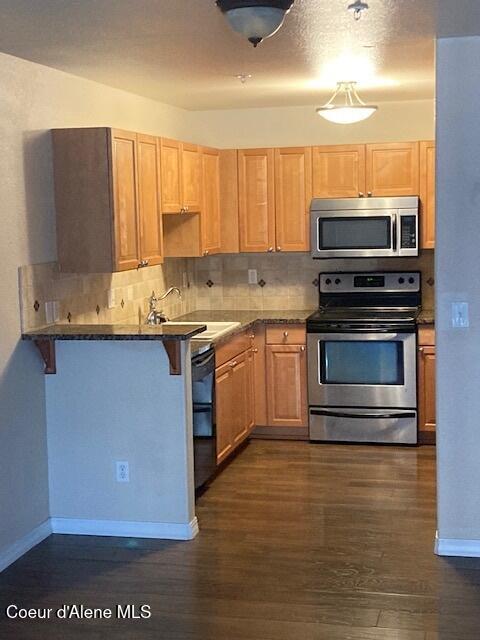 Photo of 352 Promenade LOOP #APT 207, Post Falls, ID 83854 (MLS # 26-9406)
