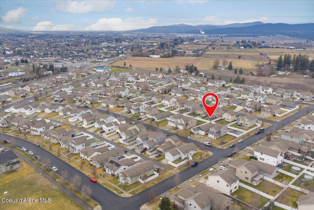 Photo of 8263 Woodworth St, Post Falls, ID 83854 (MLS # 26-964)