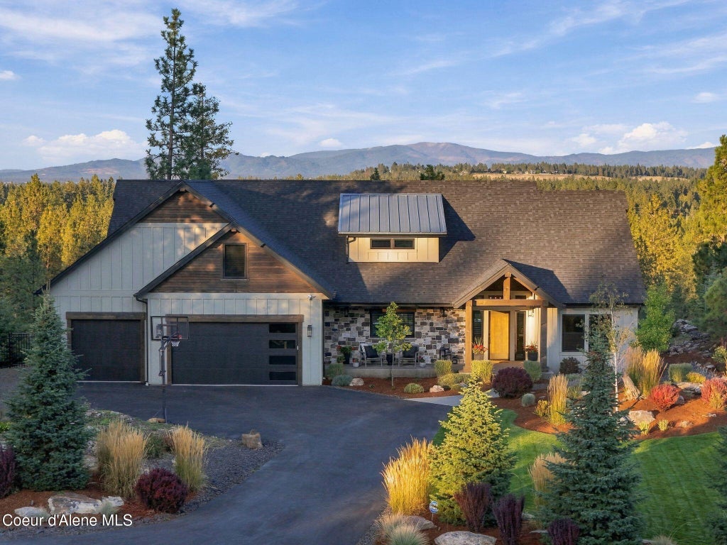 Photo of 10537 GENESEE CT, Post Falls, ID 83854 (MLS # 26-9617)