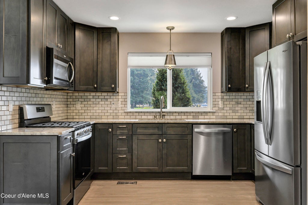 Photo of 14790 Cassia St, Rathdrum, ID 83858 (MLS # 26-8411)