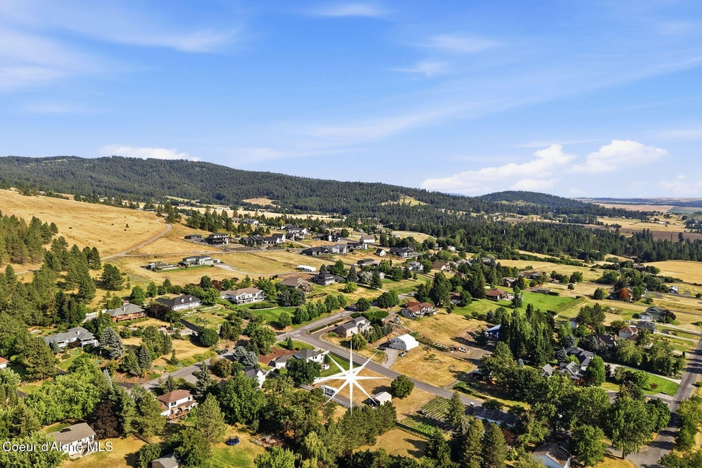 Photo of 6022 DEARBORN RD, Spokane, WA 99223 (MLS # 26-7661)