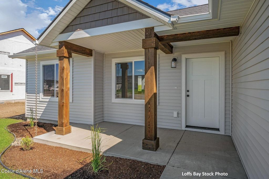 Photo of 11651 SIMMONS LN, Rathdrum, ID 83858 (MLS # 26-4448)