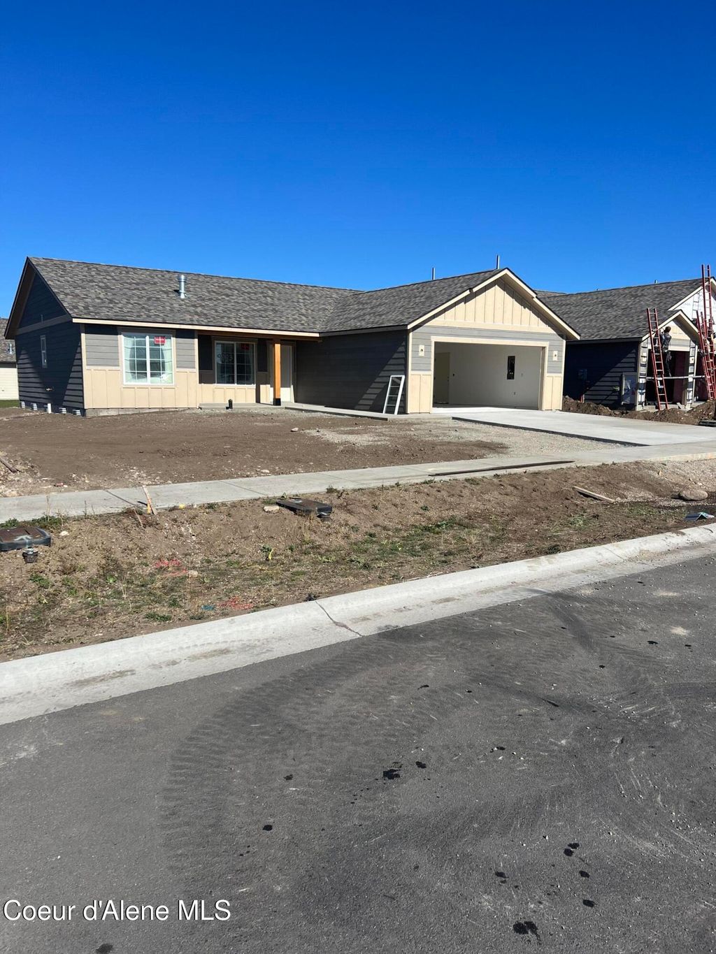 Photo of 9083 Swather Ave, Rathdrum, ID 83858 (MLS # 25-10037)