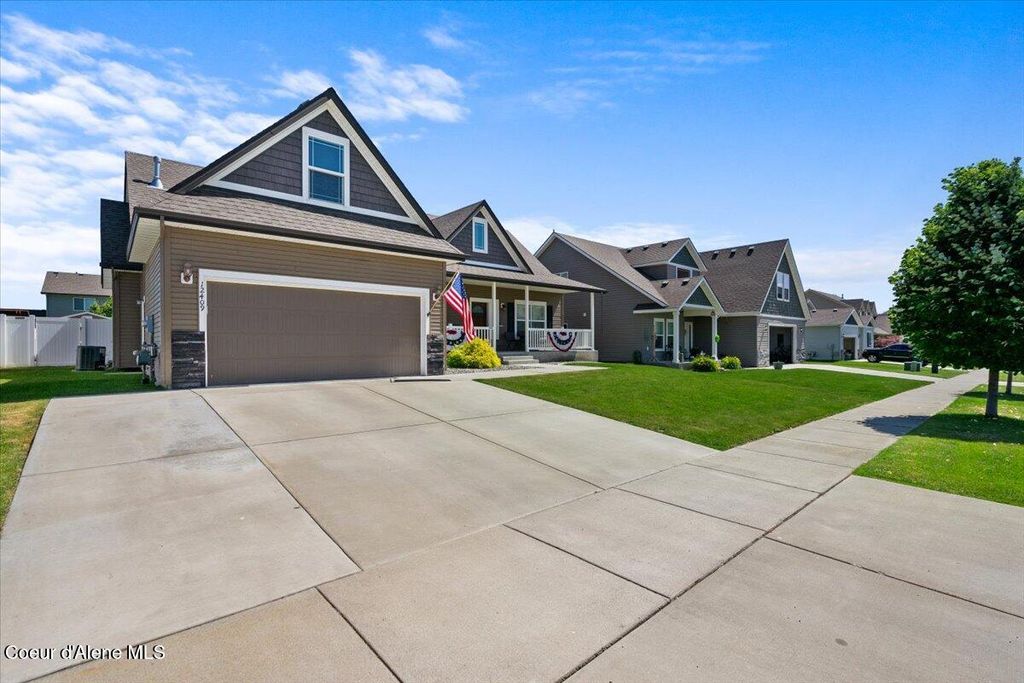 Photo of 12409 Wellington Ave, Post Falls, ID 83854 (MLS # 26-4256)