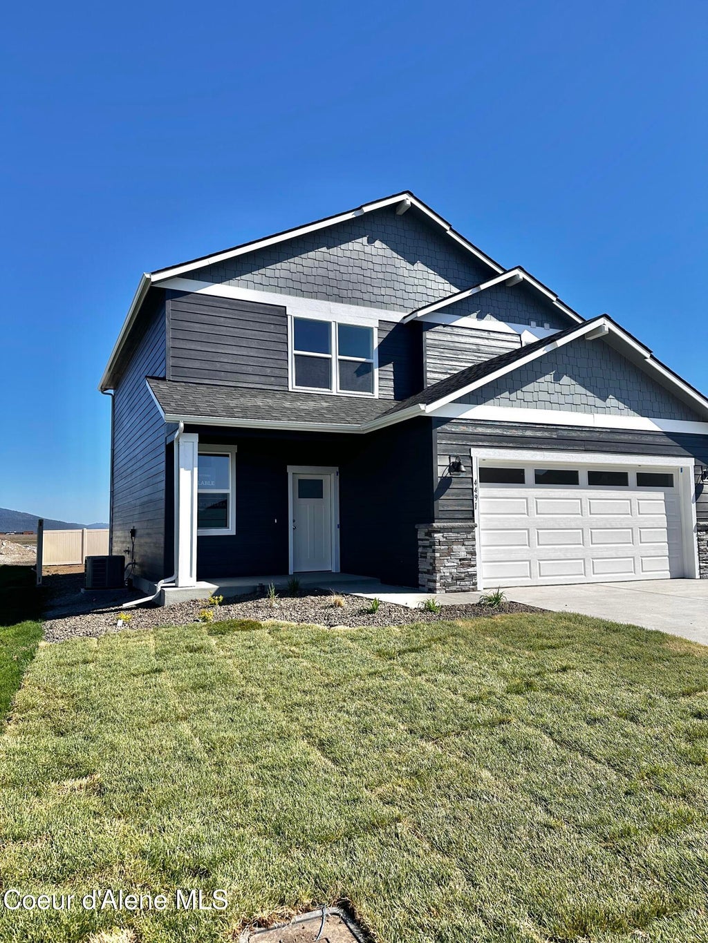 Photo of 4491 Culpeo Ave, Post Falls, ID 83854 (MLS # 26-7212)