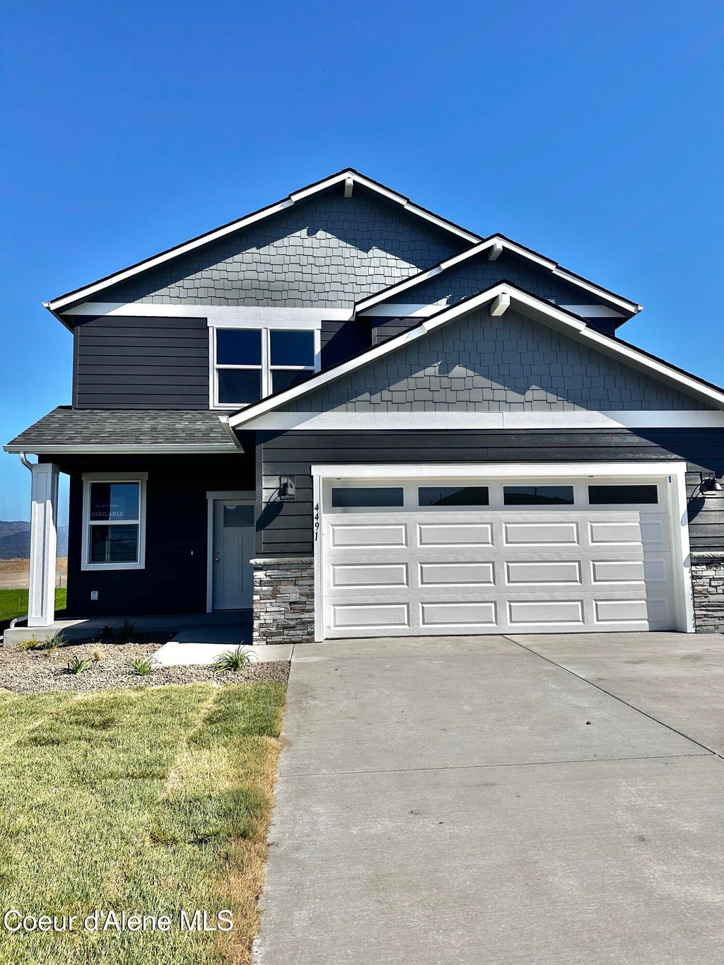 Photo of 4491 Culpeo Ave, Post Falls, ID 83854 (MLS # 26-7212)