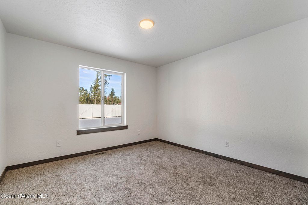Photo of 8880 Cultivator Ave, Rathdrum, ID 83858 (MLS # 25-4141)