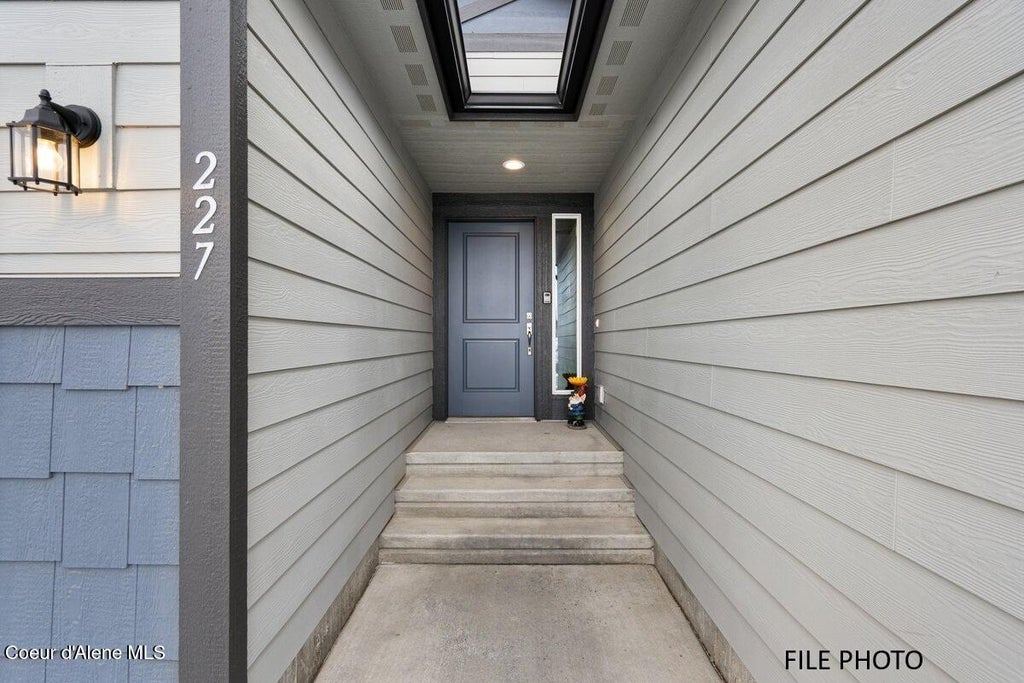 Photo of 1426 Allenby Ave, Post Falls, ID 83854 (MLS # 26-5548)