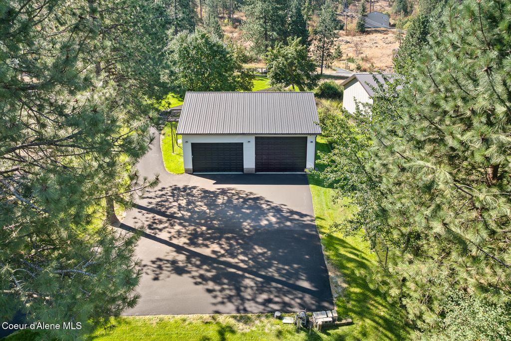 Photo of 7265 Otter Bay Rd, Coeur dAlene, ID 83814 (MLS # 26-2822)