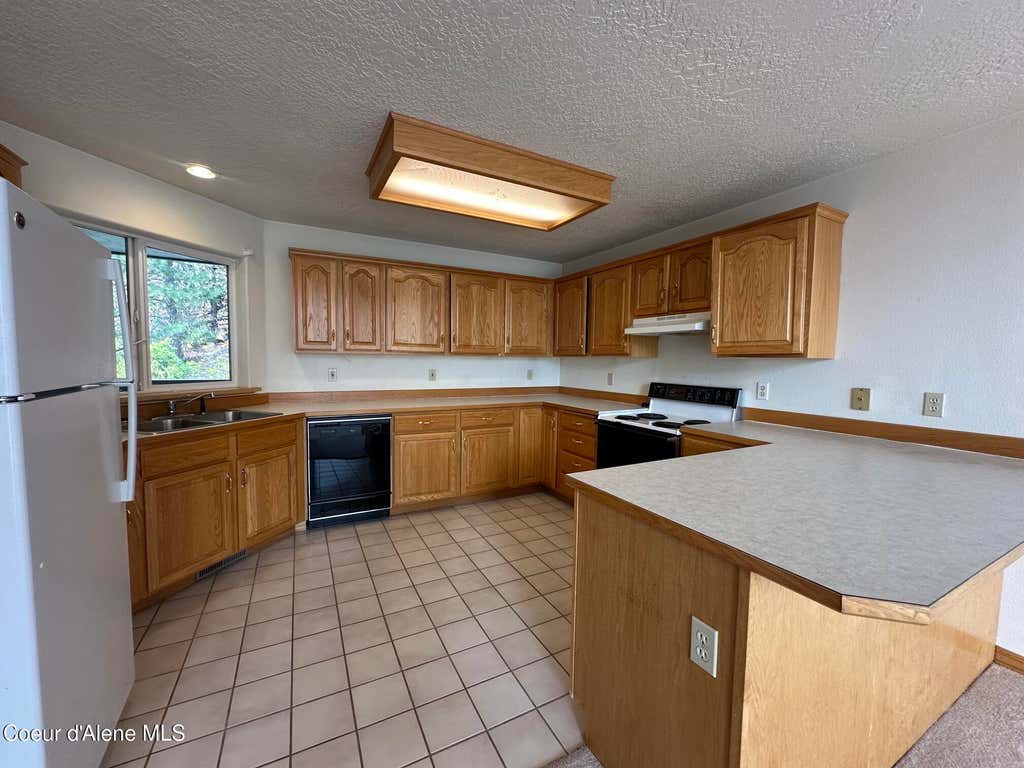 Photo of 75 Silver Ridge Ridge #203, Kellogg, ID 83837 (MLS # 26-8315)