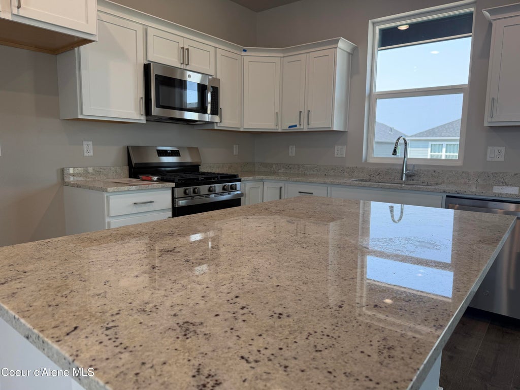 Photo of 4497 Rare Fox Ave, Post Falls, ID 83854 (MLS # 26-8885)