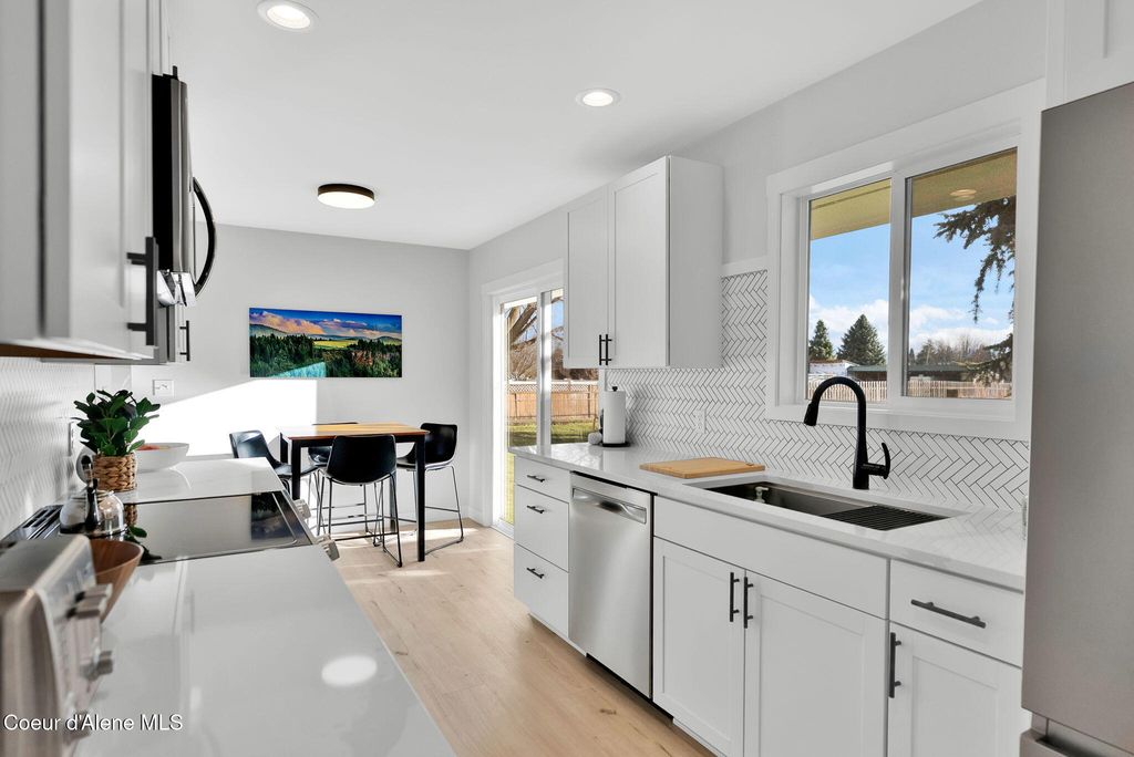 Photo of 1810 Honeysuckle Ave, Hayden, ID 83835 (MLS # 26-1556)