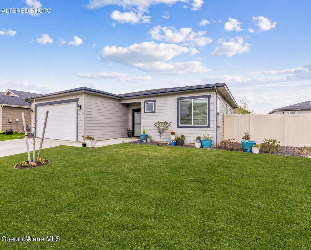 Photo of 5870 Gumwood Cir, Post Falls, ID 83854 (MLS # 26-4004)