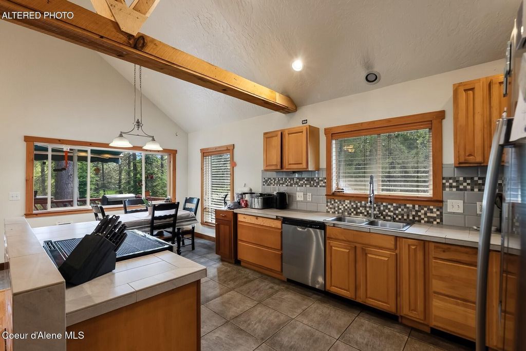 Photo of 2206 Gypsy Bay Rd, Sagle, ID 83860 (MLS # 26-6102)