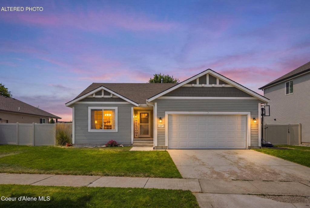 Photo of 3247 Woodford St, Post Falls, ID 83854 (MLS # 26-8110)