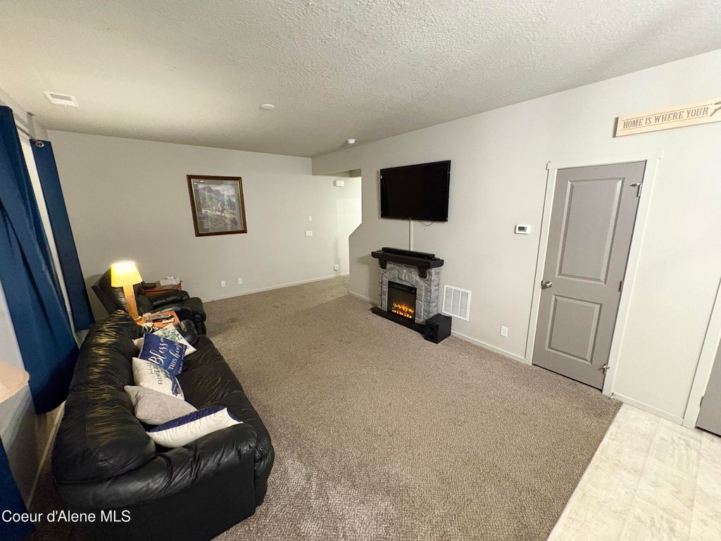 Photo of 1596 Minam Loop, Post Falls, ID 83854 (MLS # 25-11235)