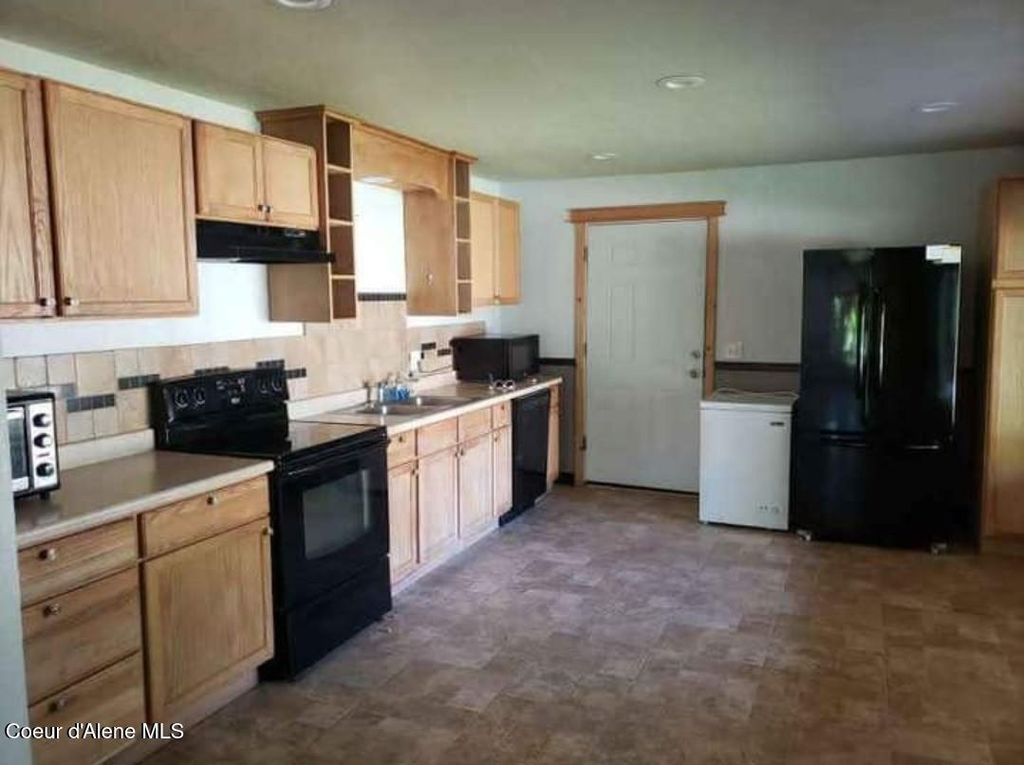 Photo of 7494 Wells St, Bonners Ferry, ID 83805 (MLS # 25-10869)