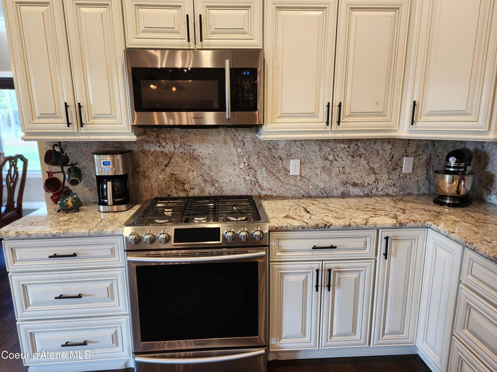 Photo of 49 Miley CT, Moyie Springs, ID 83845 (MLS # 26-10315)