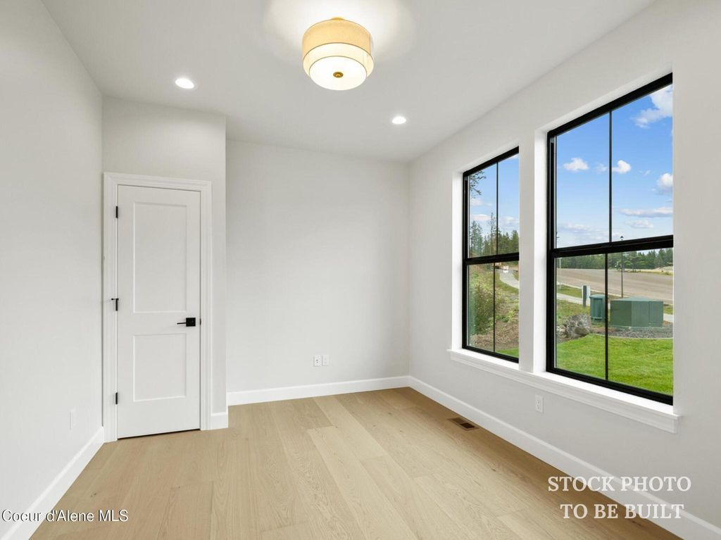 Photo of 1008 STEEPLE CHASE Rd, Hayden, ID 83835 (MLS # 26-5929)