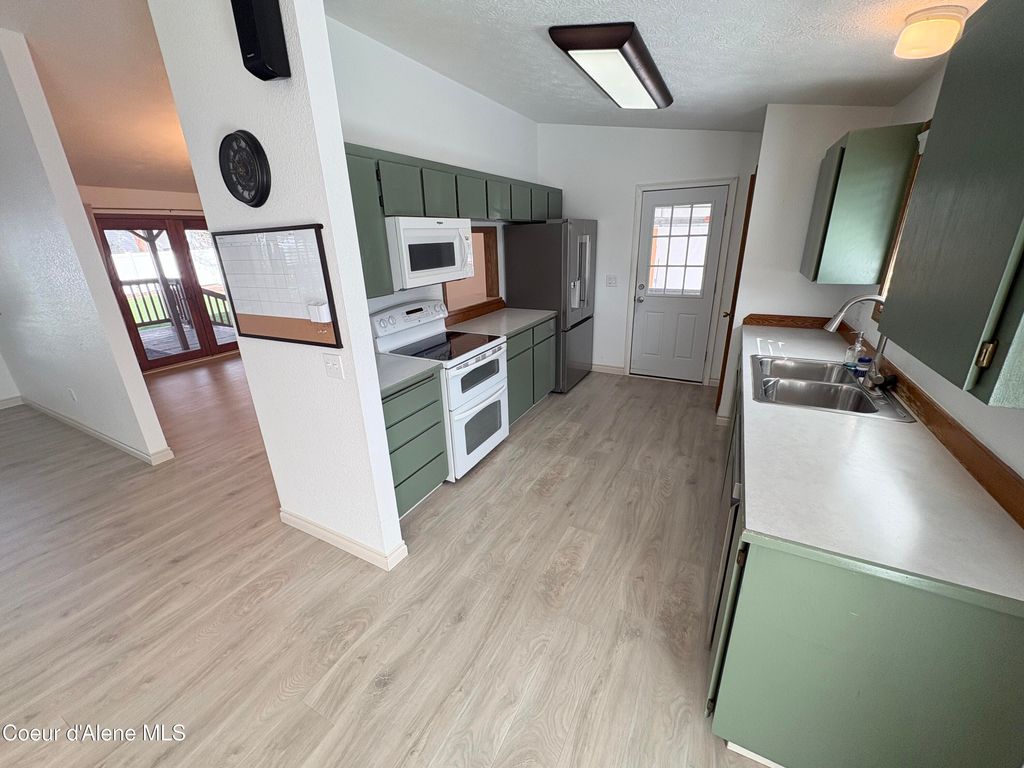 Photo of 416 Timber Ln, Post Falls, ID 83854 (MLS # 26-3614)