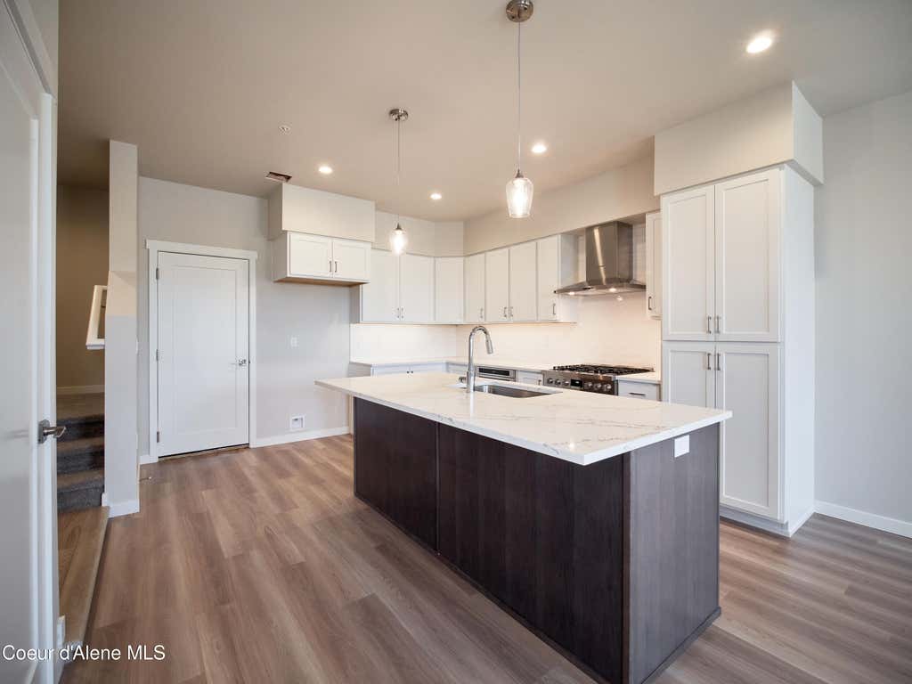 Photo of 1042 4TH AVE, Post Falls, ID 83854 (MLS # 26-8143)