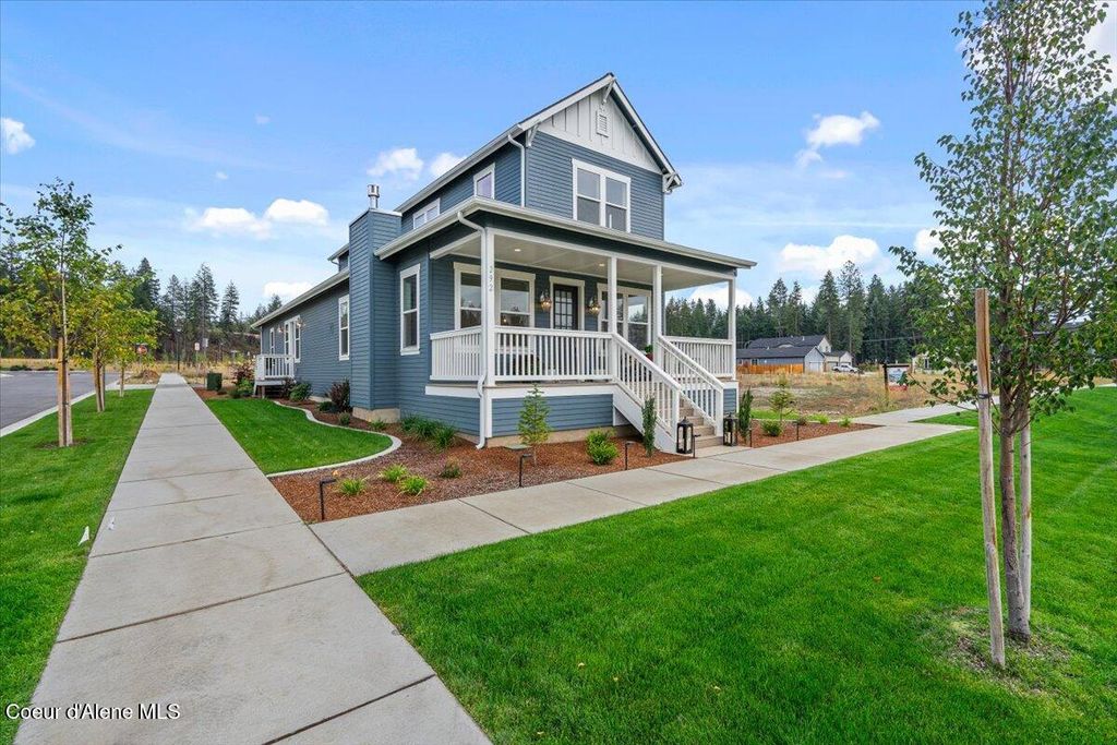 Photo of 304 E Grosbeak, Hayden, ID 83835 (MLS # 25-7730)