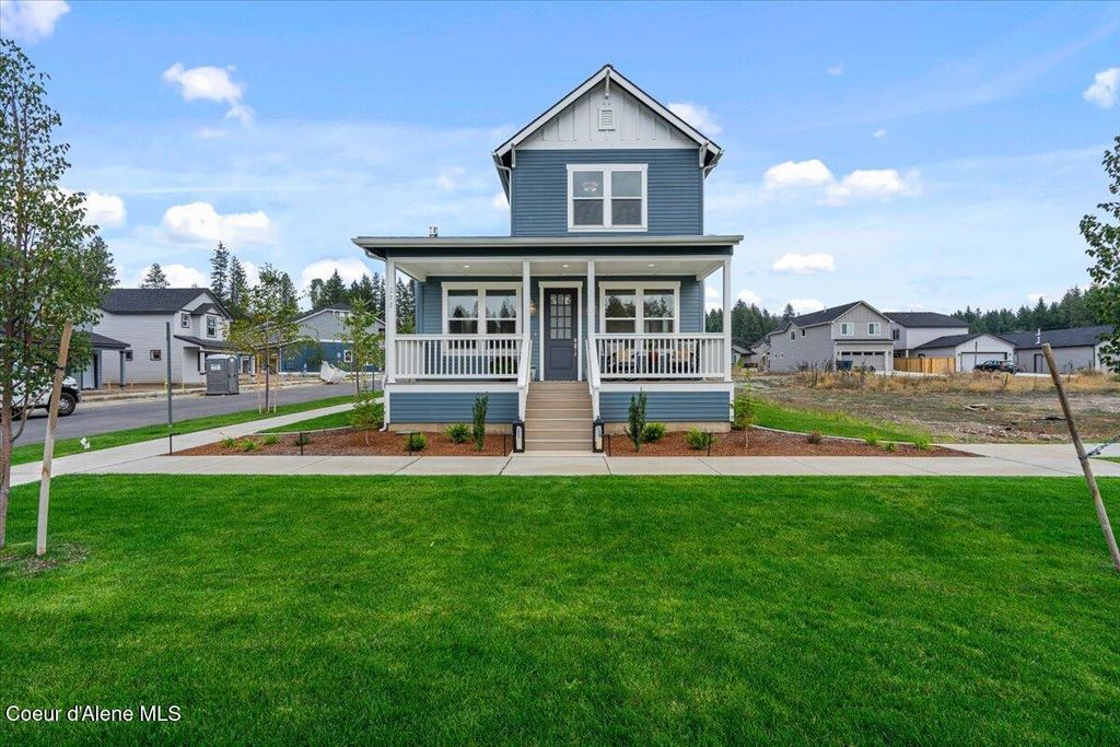 Photo of 304 E Grosbeak, Hayden, ID 83835 (MLS # 25-7730)